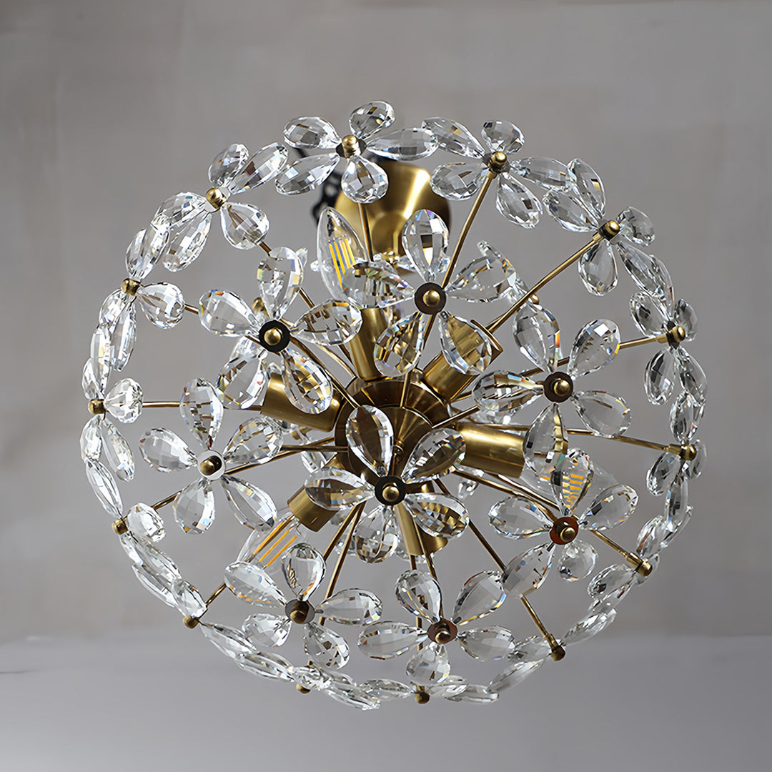 Clear crystal flower chandelier with brilliant faceted elements and pristine transparency