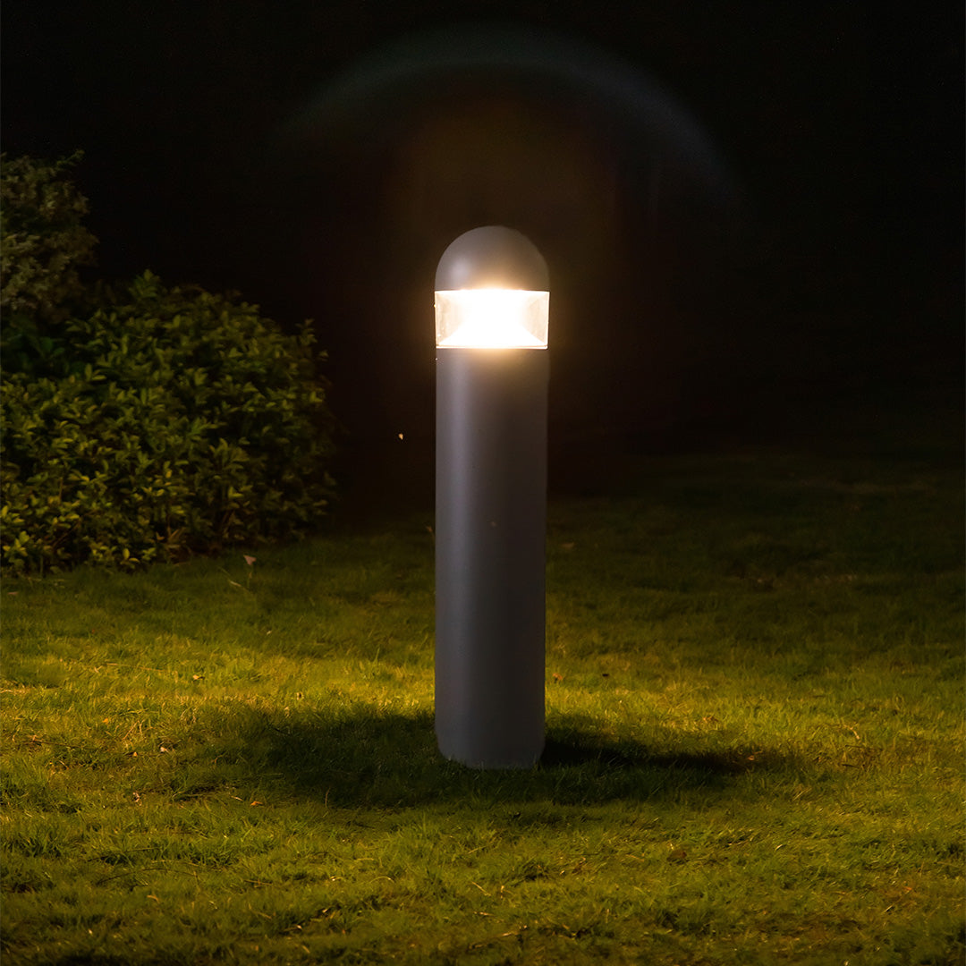 Modern cylindrical light with clear horizontal section and dark gray finish