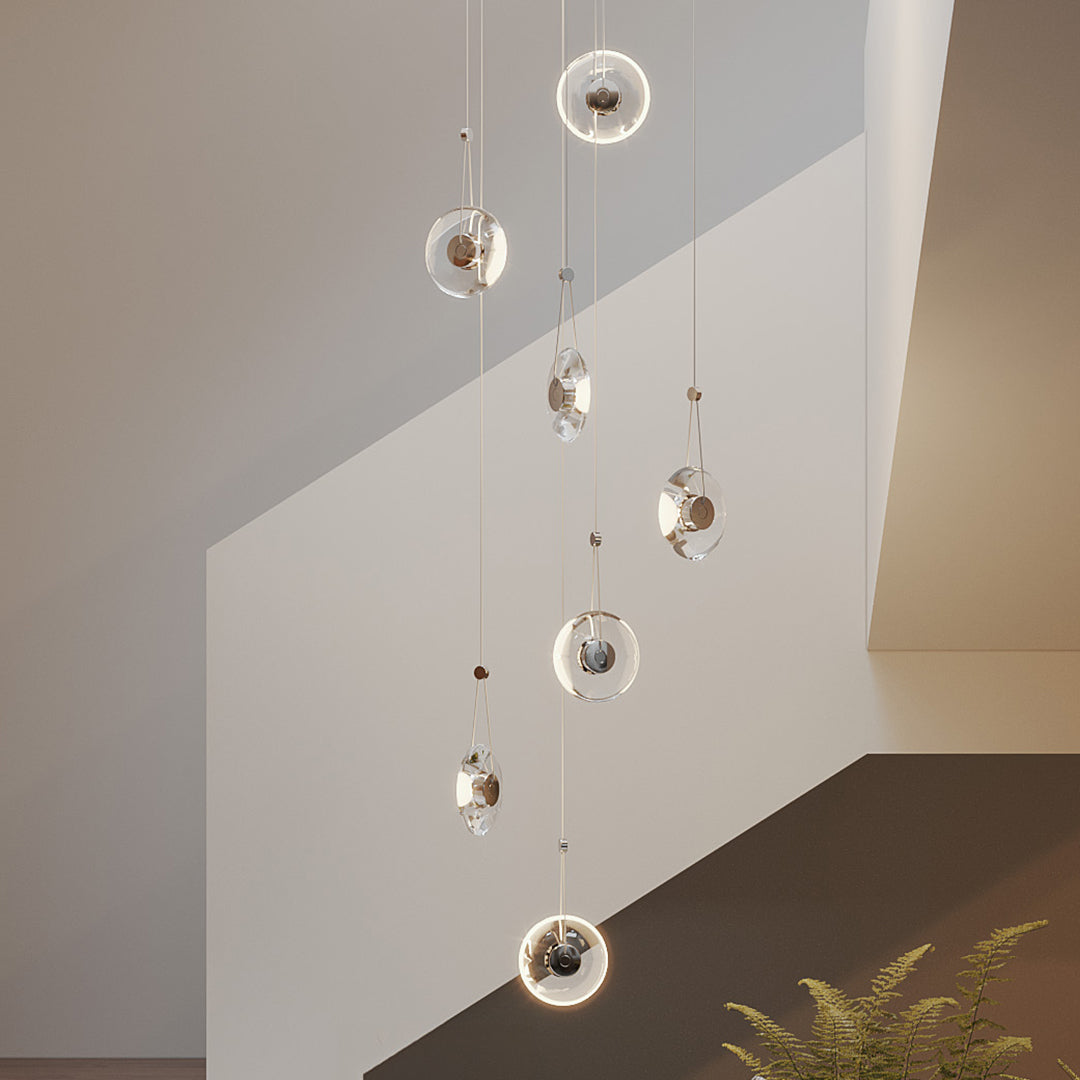 Warm-toned interior featuring multiple clear pendant lights hanging in a cozy living area.