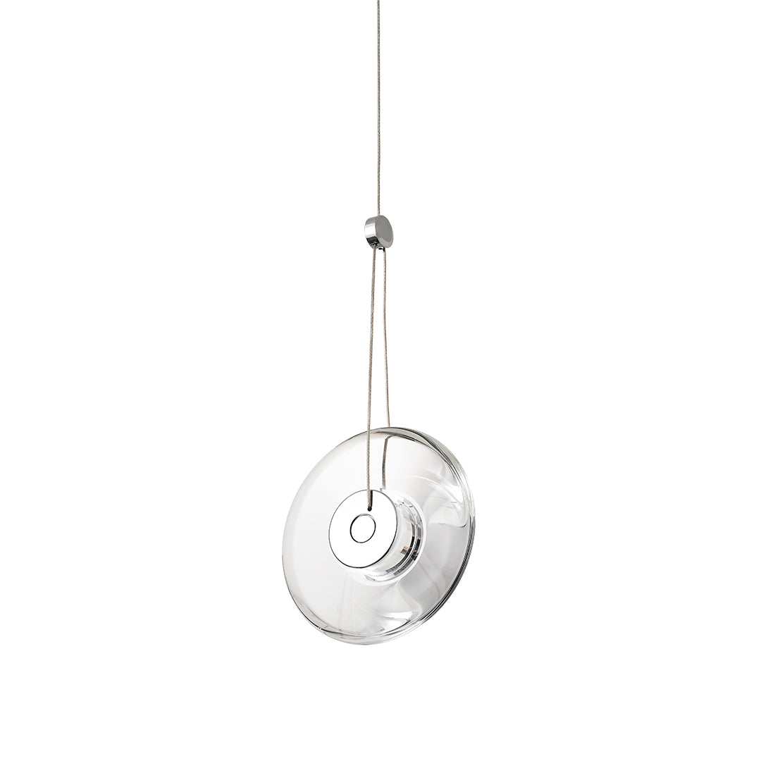 Round clear pendant light with silver hardware, perfect for kitchen or dining areas.
