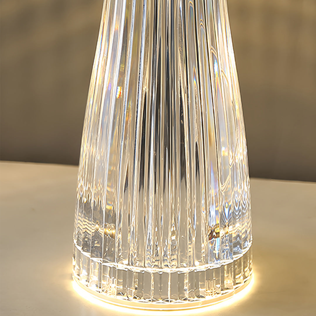 Detailed view of clear table lamp showing intricate ribbed glass construction and craftsmanship