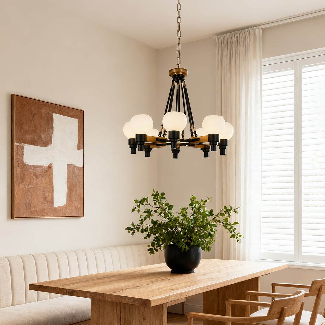 Close-up view of the 8 light chandeliers, highlighting the exposed bulbs and the clean, angular lines of the bronze-finished steel frame.