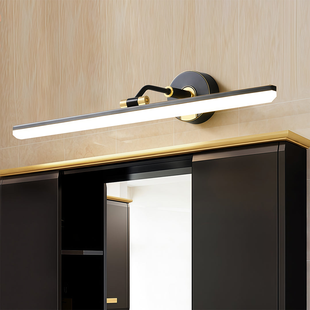 Close-up of bathroom vanity LED light, highlighting the black and gold details and sleek design.