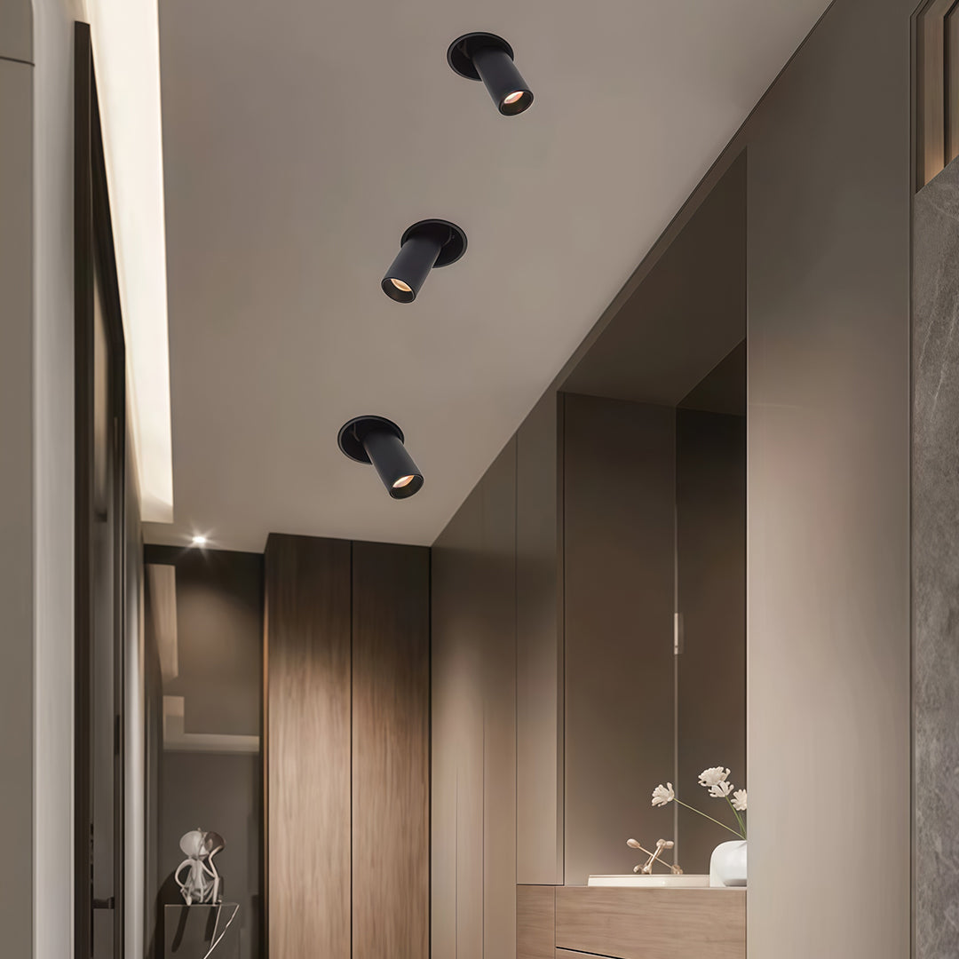 Close-up view of black adjustable LED ceiling spotlights reflector with glass shade chandelier inspired COB LED technology.