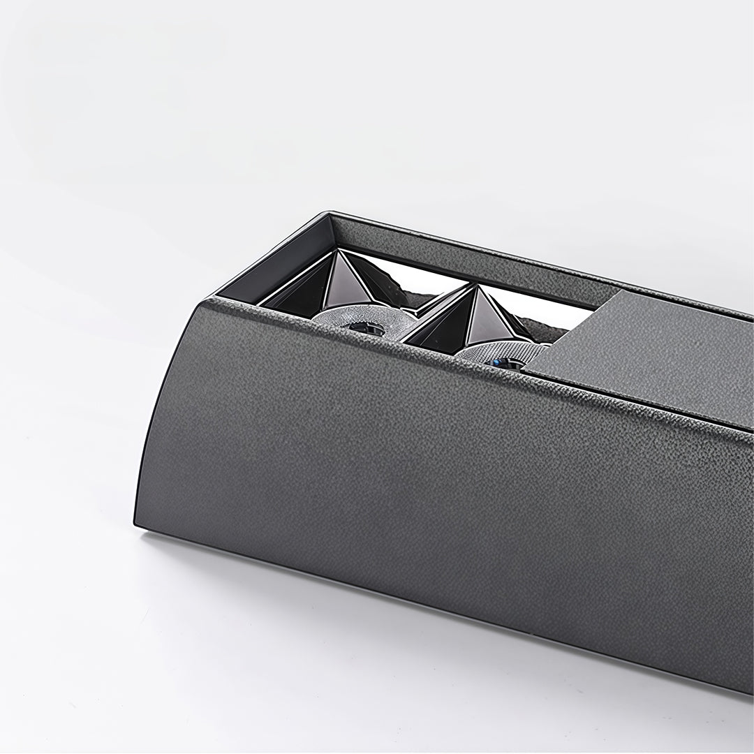 Close-up detail of a black surface-mounted square downlights fixture showcasing its anti-glare reflector design.