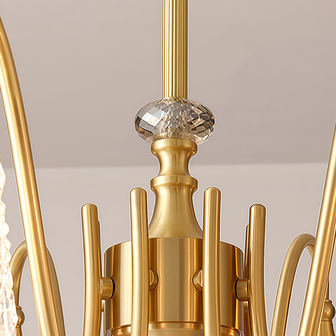 Brass vintage chandelier with a close-up of the top, showcasing the intricate brasswork and crystal accents.