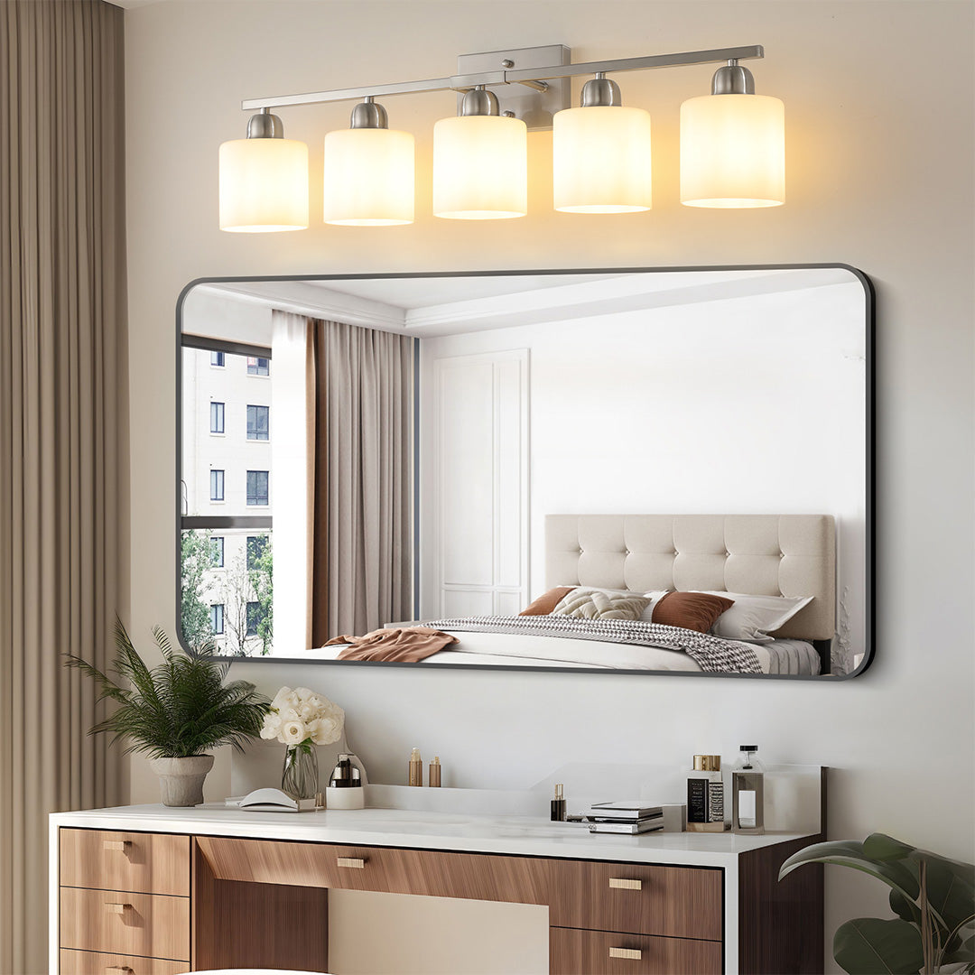 Modern bathroom vanity light with a close-up view of the bulb and fixture, showcasing its design details.