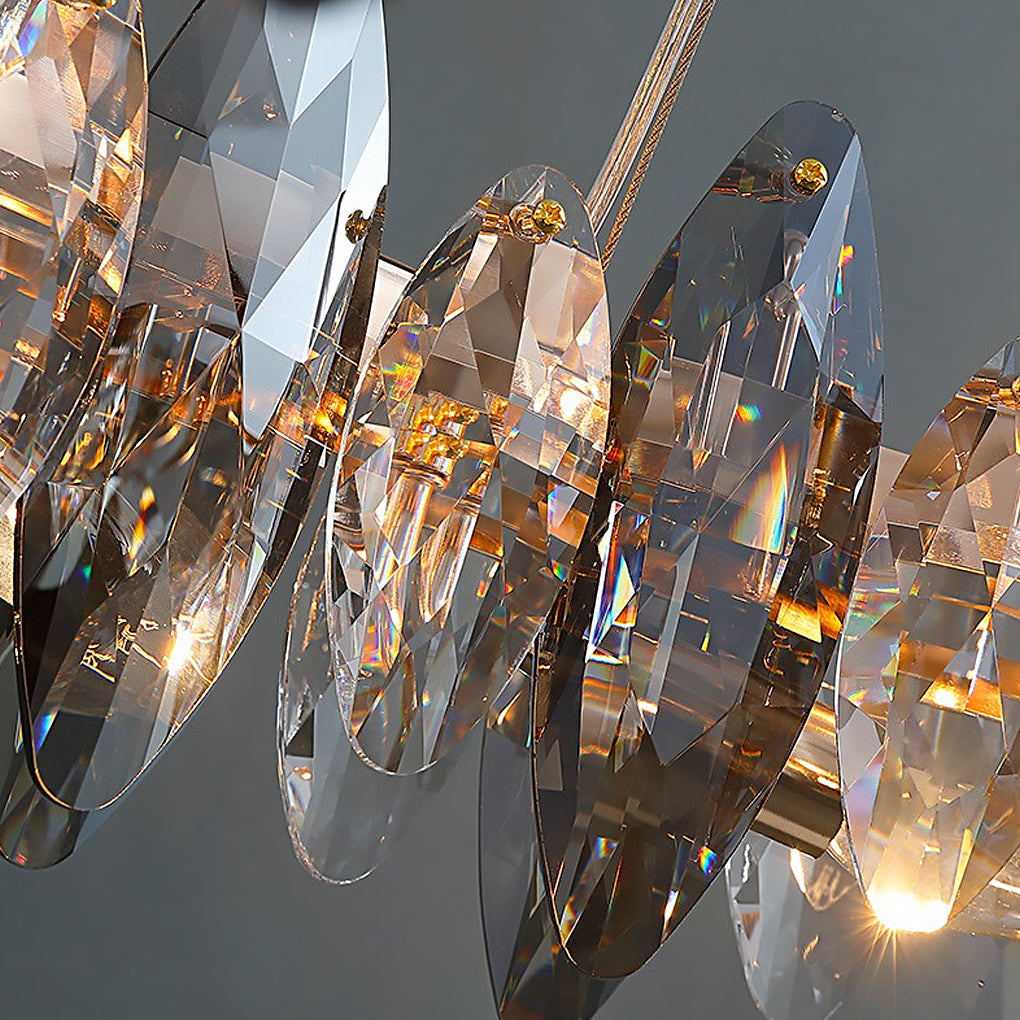 Close-up of large chandelier with crystals highlighting the intricate light reflection.