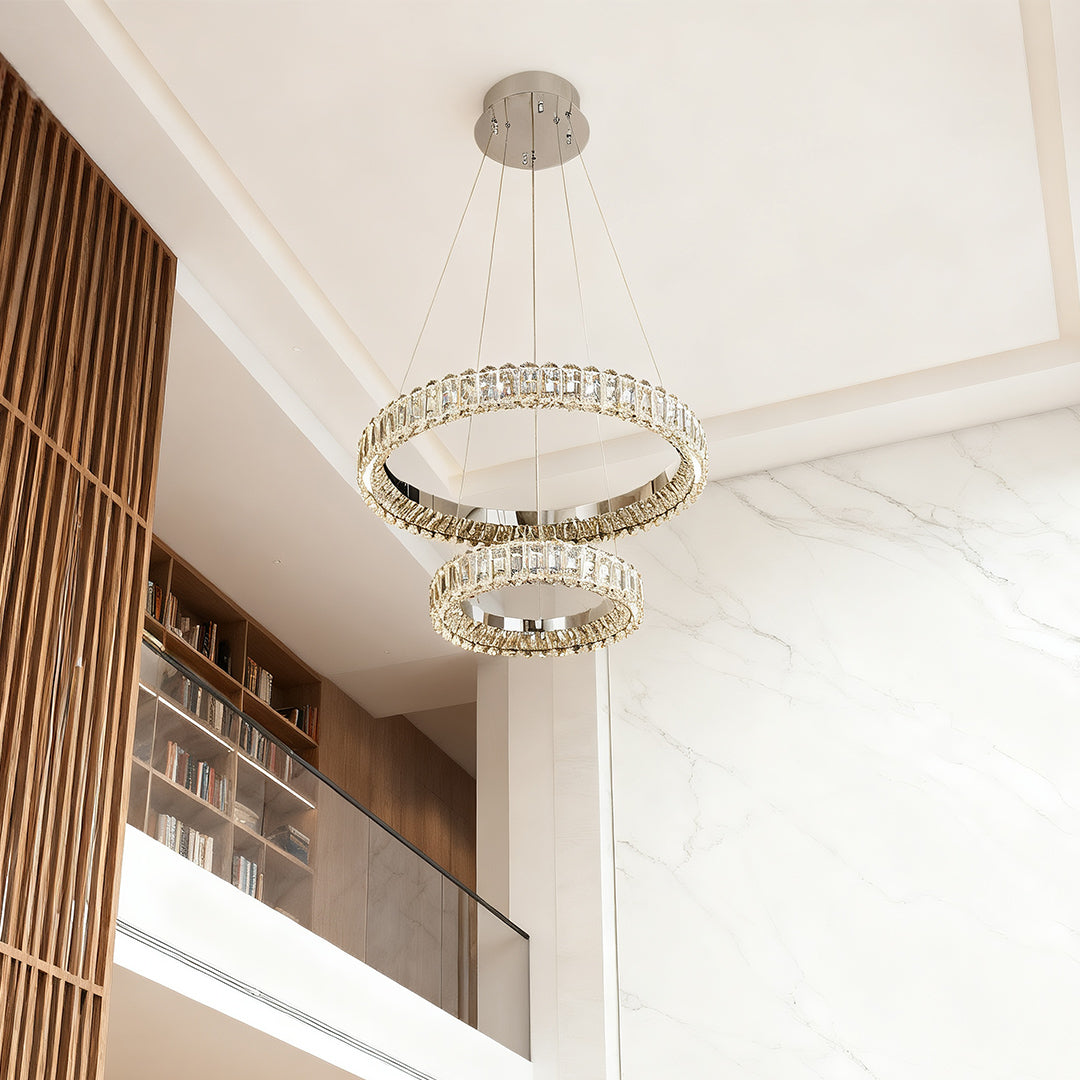 Close-up of a circle chandelier, highlighting the crystal details and metallic frame.