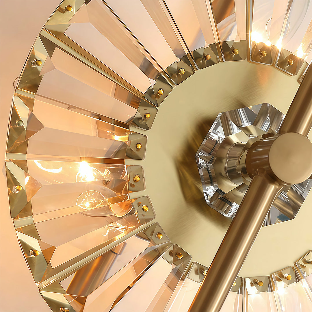 Close-up detail of crystal wall sconces lighting featuring glass shade chandelier aesthetic showing intricate crystal and metal construction.