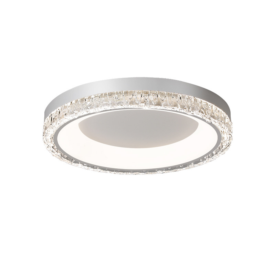 Close-up of the embedded crystal elements inside the decorative rim of the modern white flush mount ceiling light.