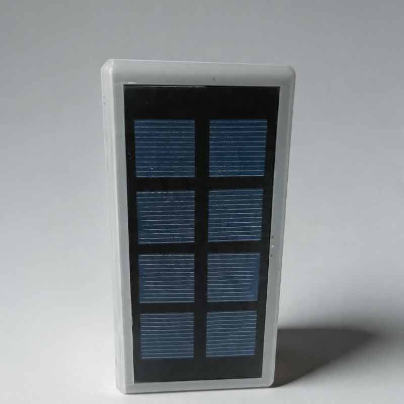 Close up front view showing the textured solar panel of rectangular solar powered lights for steps