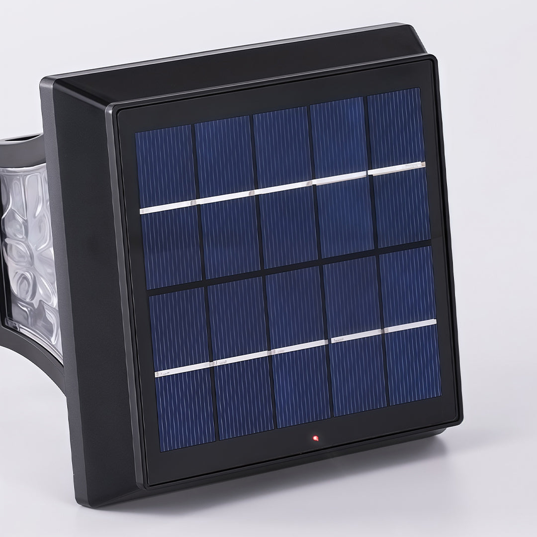 Detailed close-up of the high-efficiency square solar panel on the outdoor solar path lighting fixture.