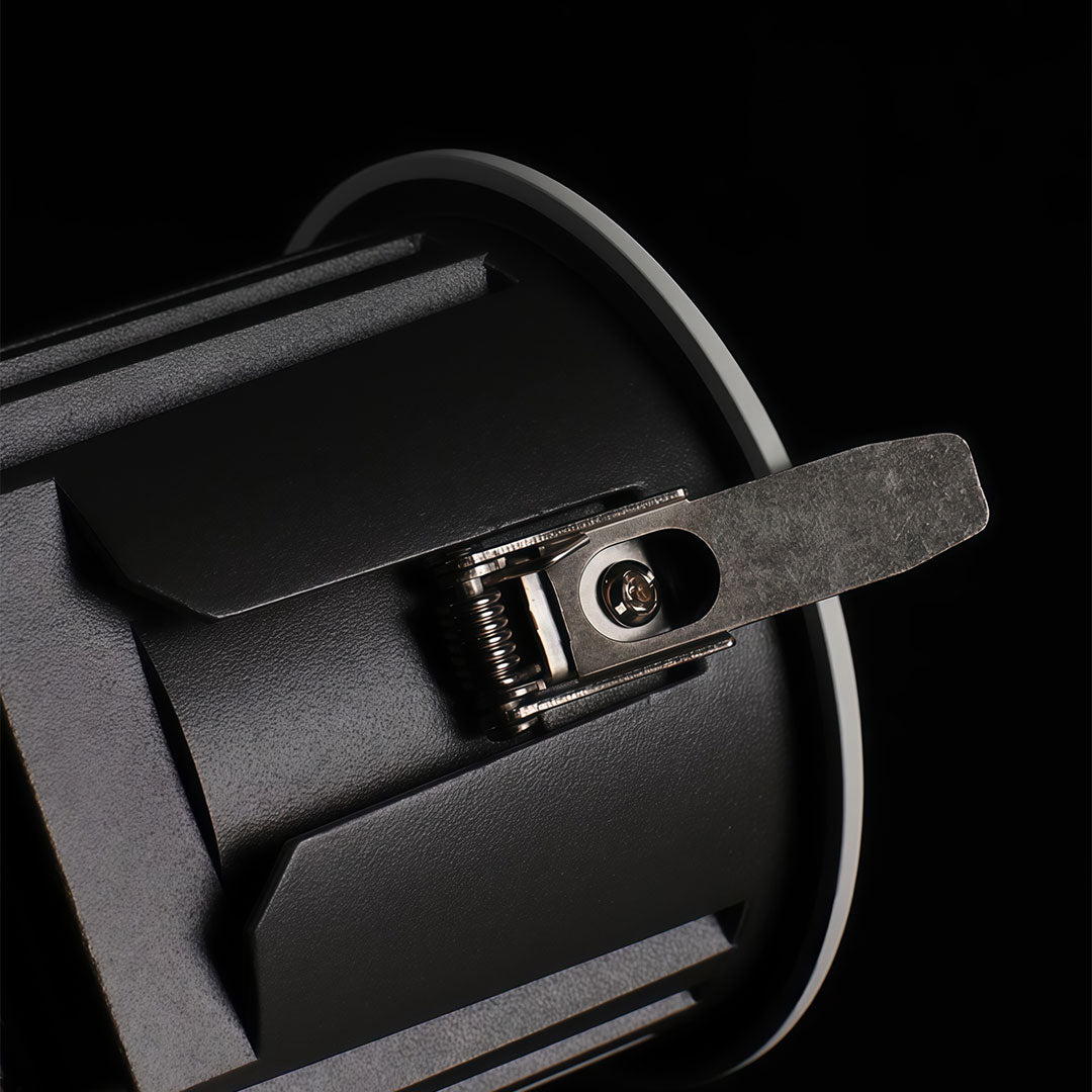 Close-up of inset ceiling spotlight with sleek design and focused beam.