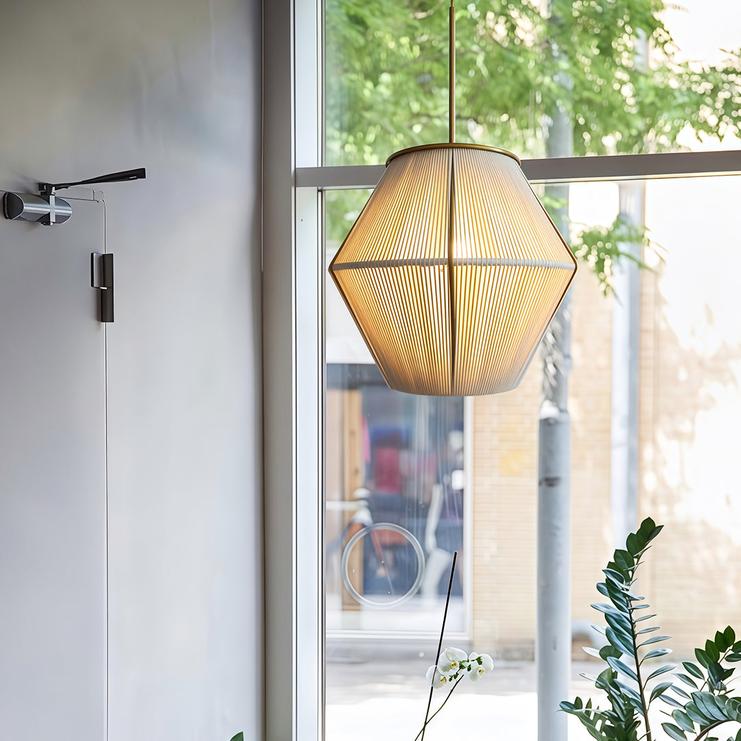 Close-up view of a Japanese-style pendant light showcasing its intricate design and natural texture.