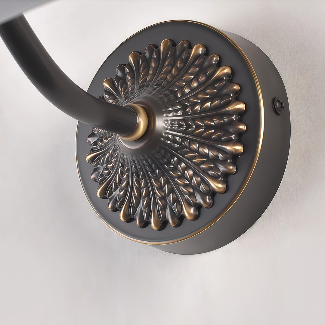 Close-up of the decorative brass socket on LED vanity bathroom lights, highlighting intricate design details