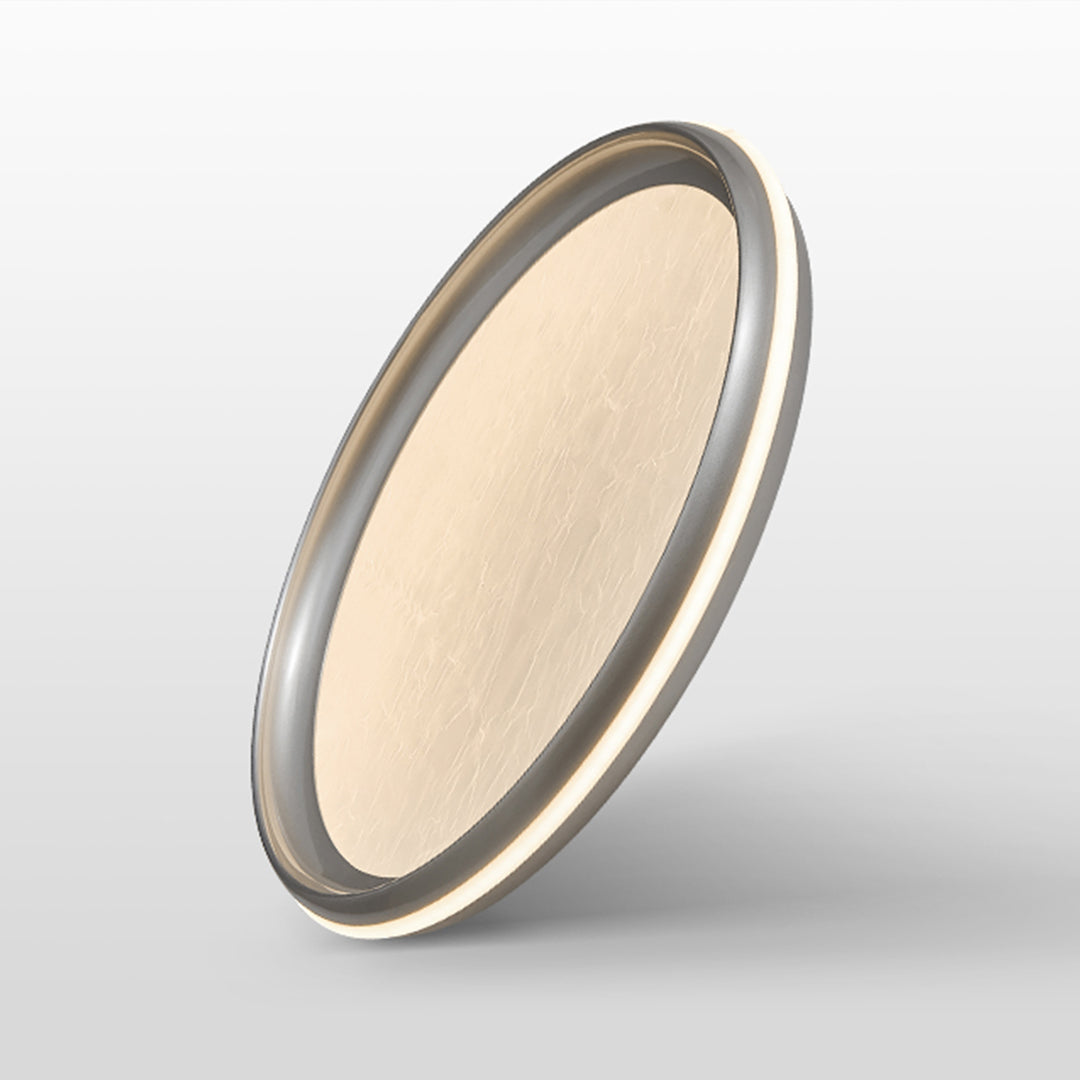 Close-up of metal flush mount light texture, detailed view of brushed metal surface