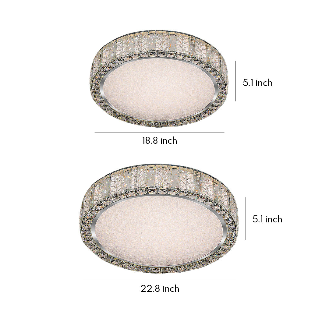 Close-up of a modern flush mount ceiling light, highlighting the crystal details and metallic frame.