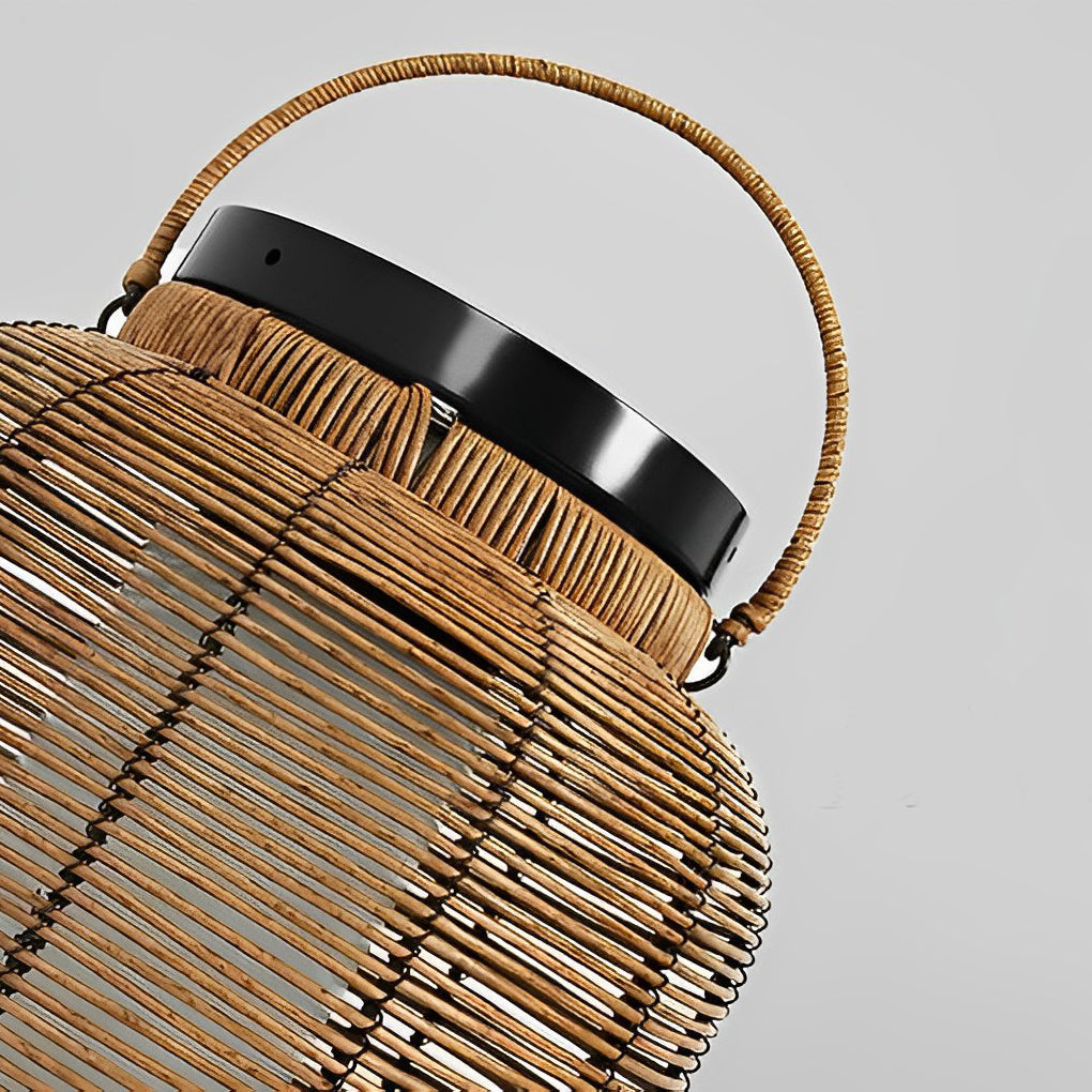 Close-up of outdoor rattan lanterns showing detailed weave and handle.
