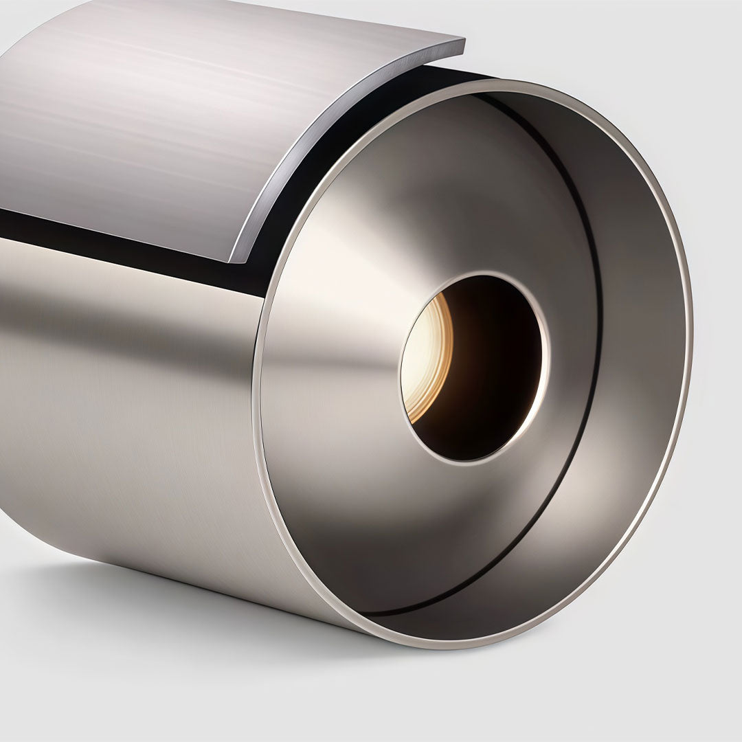 Close-up of silver ceiling spotlight showcasing the sleek metallic finish and design.