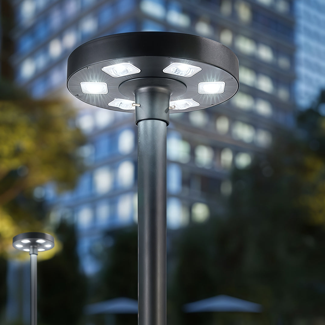 Close-up of a solar-powered streetlight, showing the panel and LED lights for energy-efficient lighting.