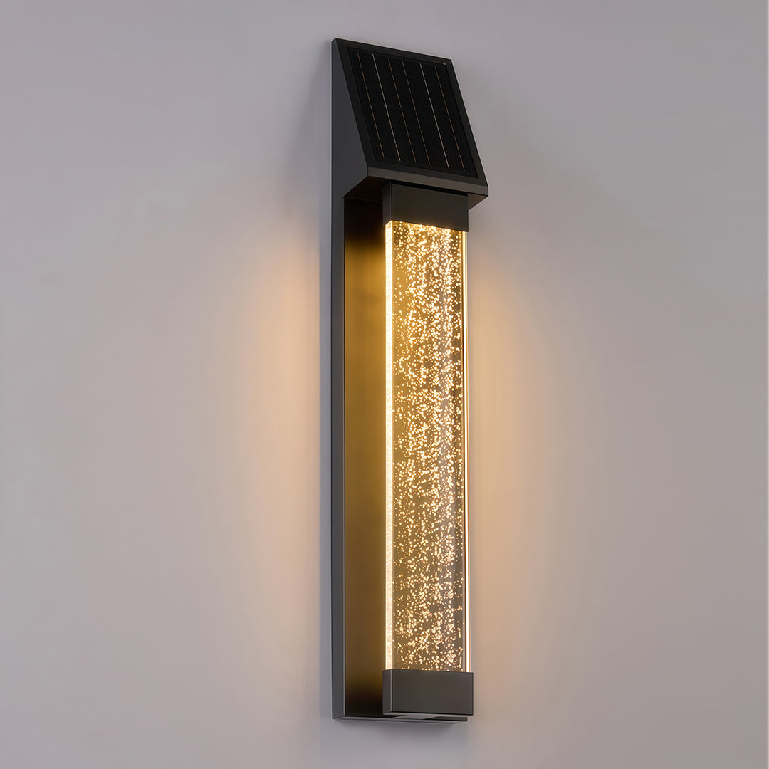 Black outdoor lighting sconce with a close-up view of the textured glass, showcasing its unique design.