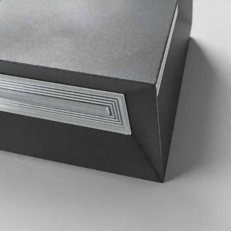 Close up top view of square pillar lights showing the smooth matte black finish and edges ok.