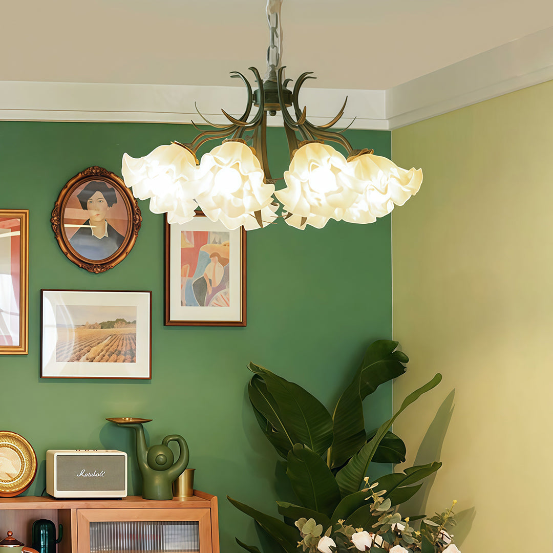 Close-up of a vintage flower chandelier, highlighting the delicate white floral shades.