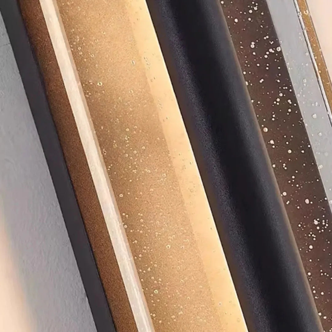 Close-up of wall mount outdoor lighting showing the textured diffuser and black aluminum frame.