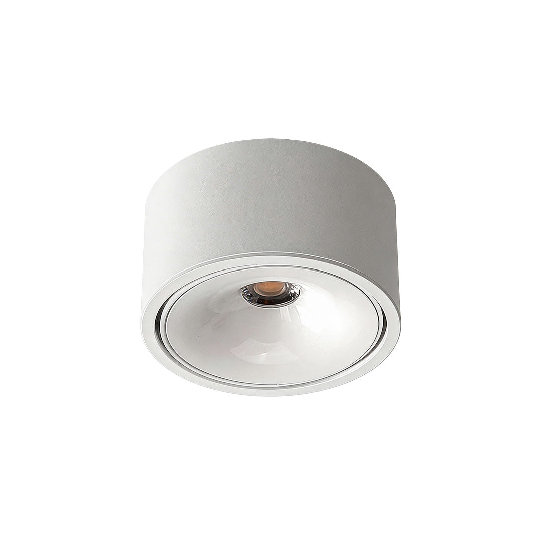 Close-up of white ceiling spotlight showing a sleek design and clear light distribution.