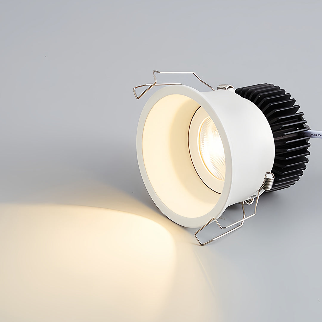 Close-up of a white square recessed downlight with adjustable COB LED