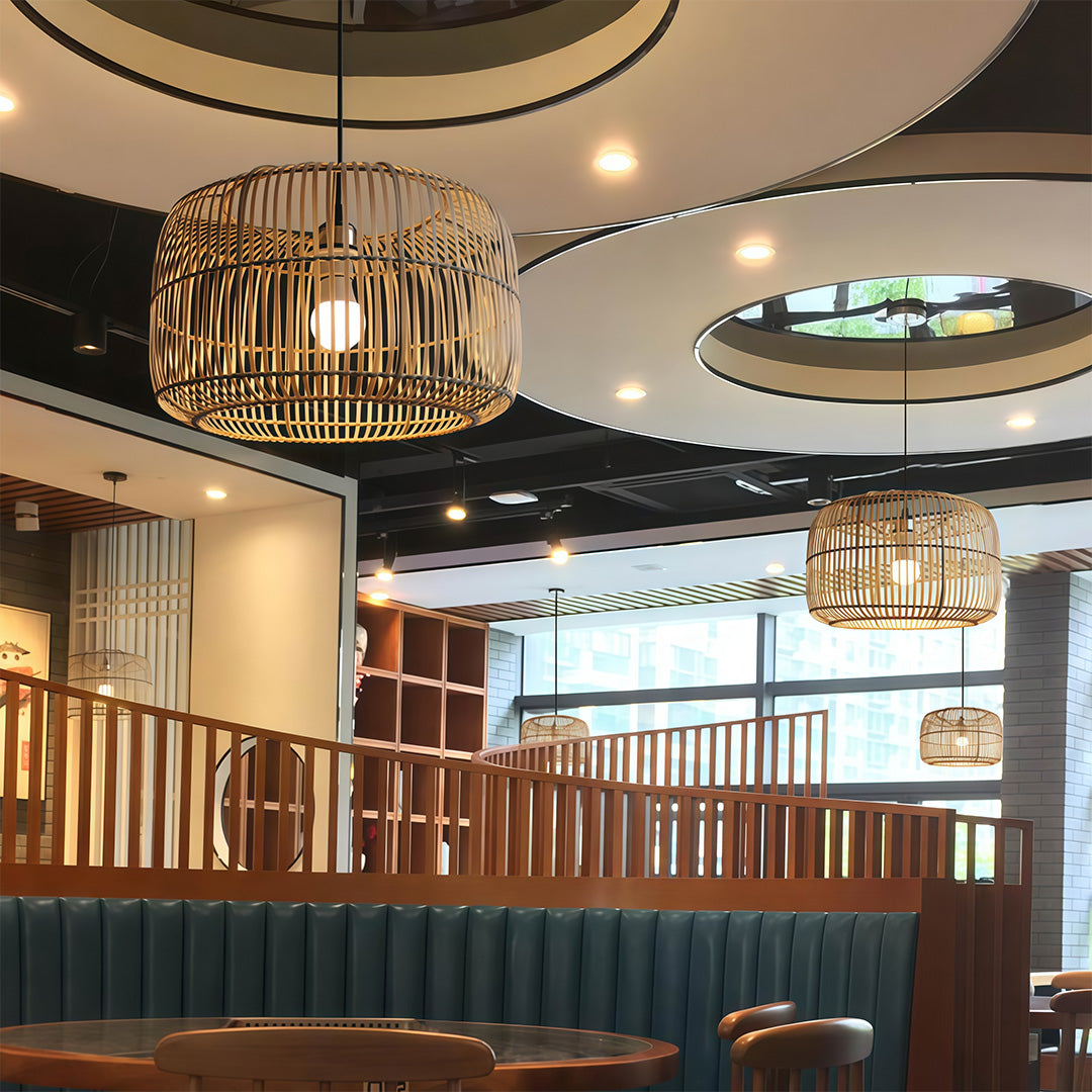 Close-up of a woven pendant light fixture, showcasing its intricate design and light texture.