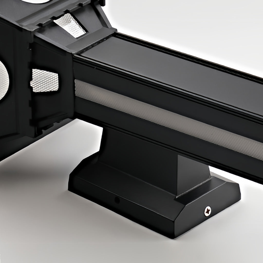 Close-up detail of outdoor wall column lights in black metal construction.