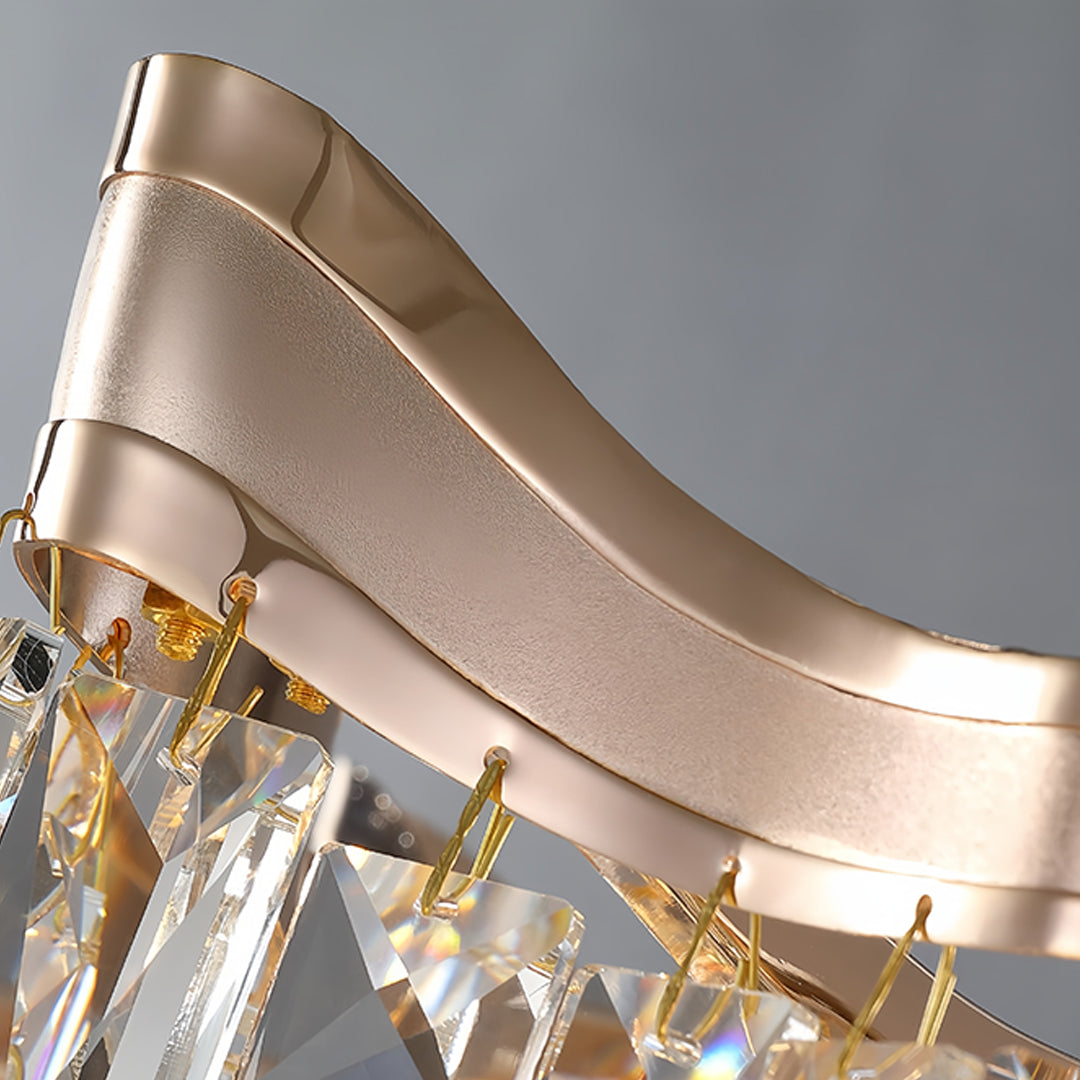 Details of grand tiered glass chandelier with cascading crystal tiers