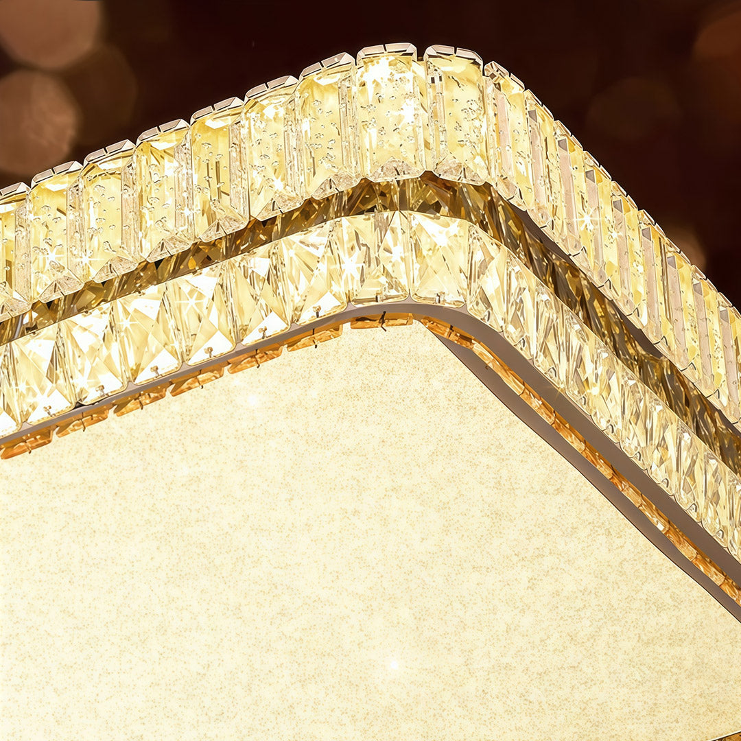 Close-up of contemporary flush mount lighting featuring glass shade chandelier aesthetic with intricate crystal detailing and warm glow.