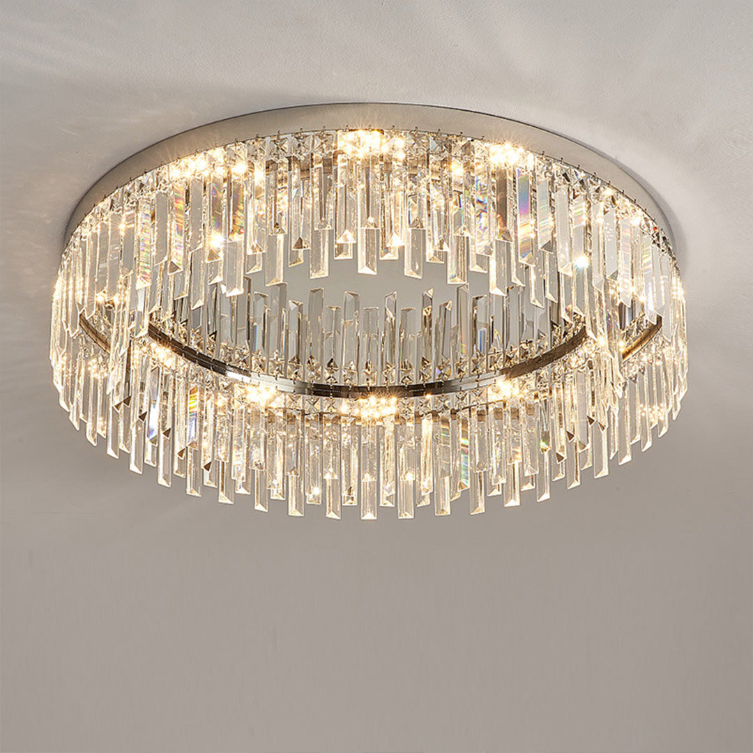 Large oval crystal ceiling light providing elegant illumination in neutral interior