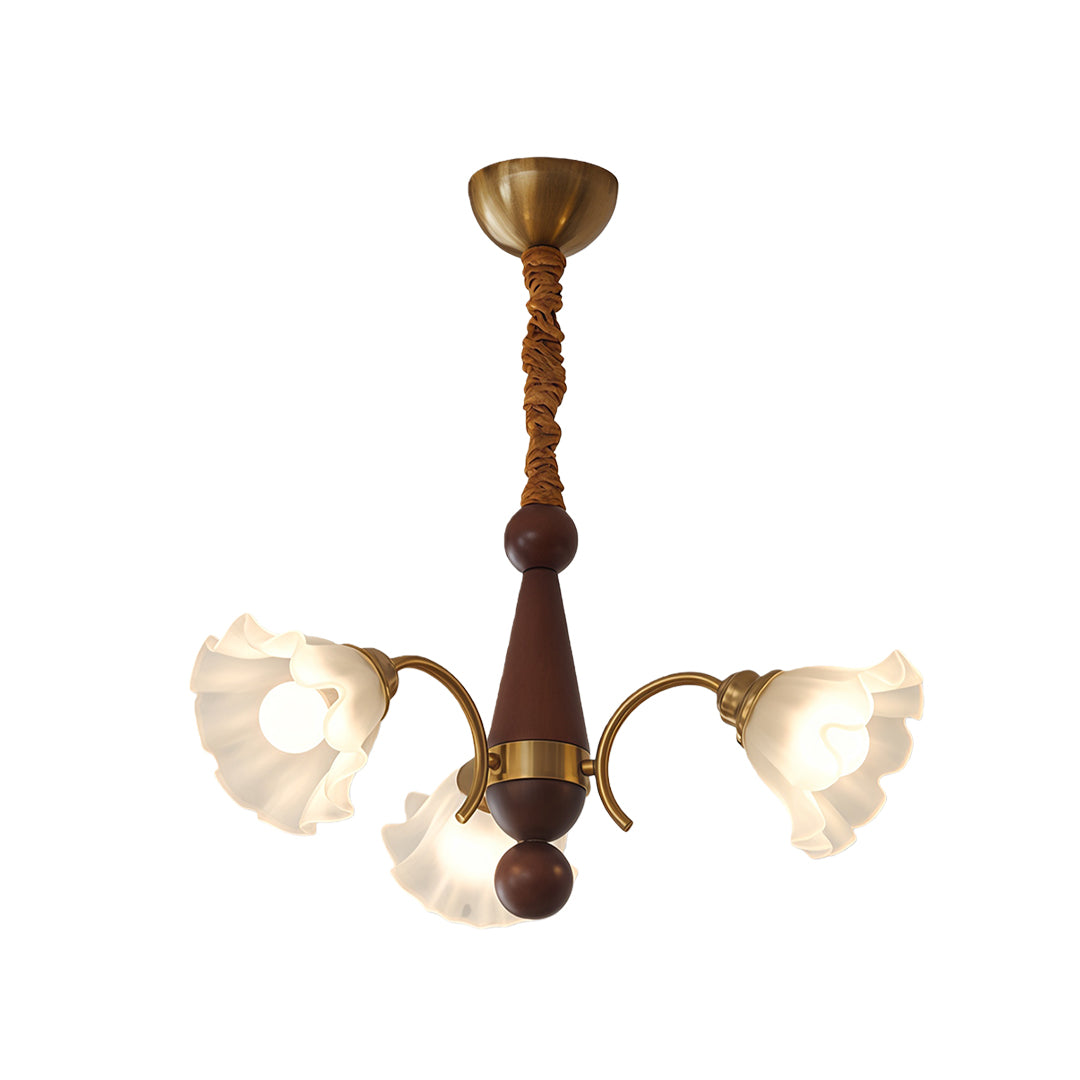 Close-up detail of crystal vintage chandelier showing brass socket and curved arm connection with wood center.