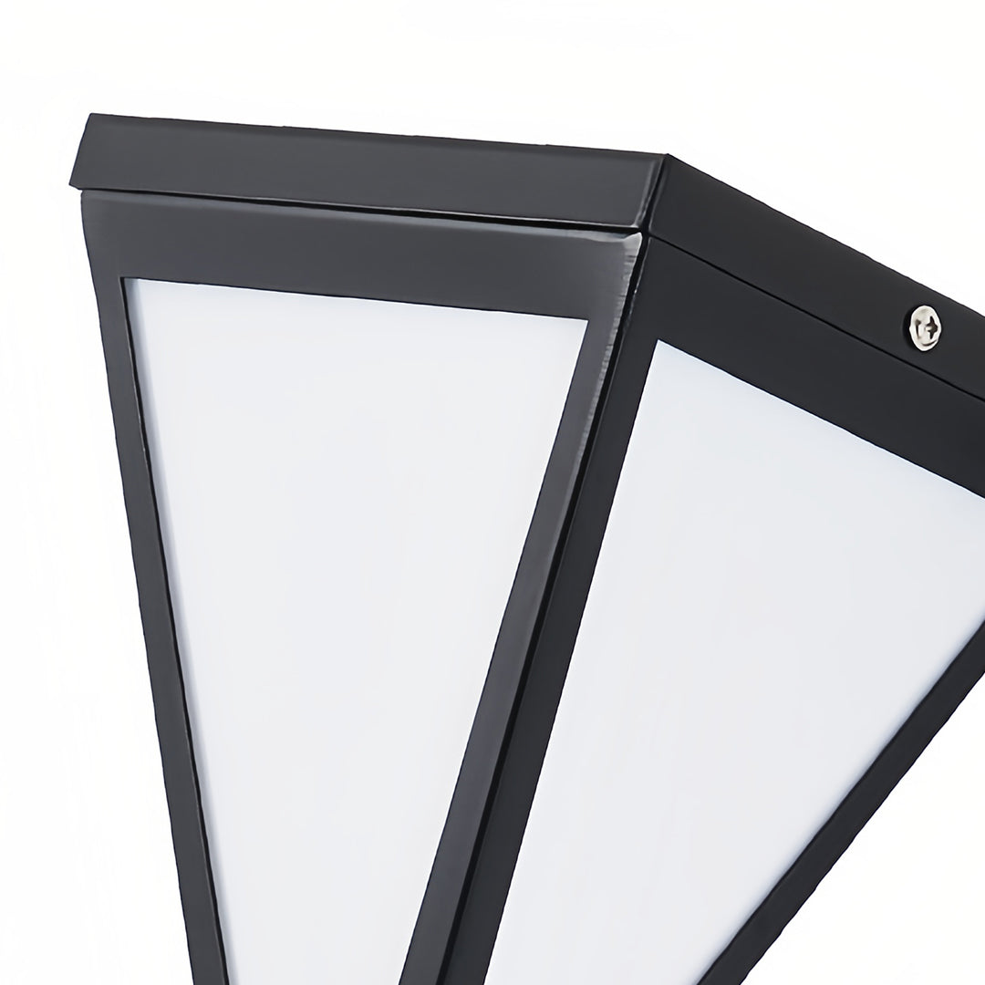 Outdoor solar lights wall mounted close-up showing angled white diffuser.