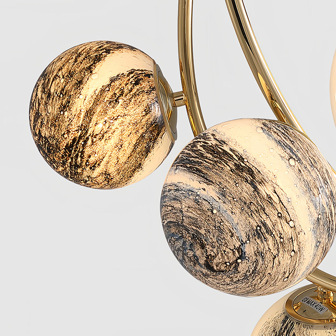 Close-up detail of gold semi flush ceiling light showing premium textured glass and brass finish