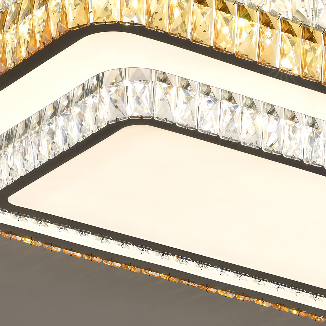 Close-up detail of modern flush mount light fixture showing golden frame and crystal edge.