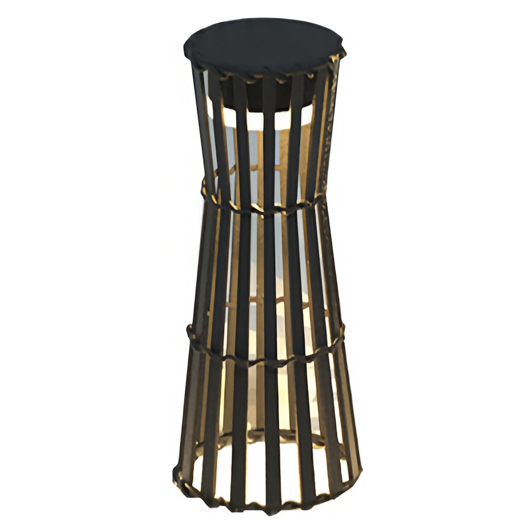 Close-up of the intricate vertical slat design and warm light glow of the outdoor black lanterns cage.