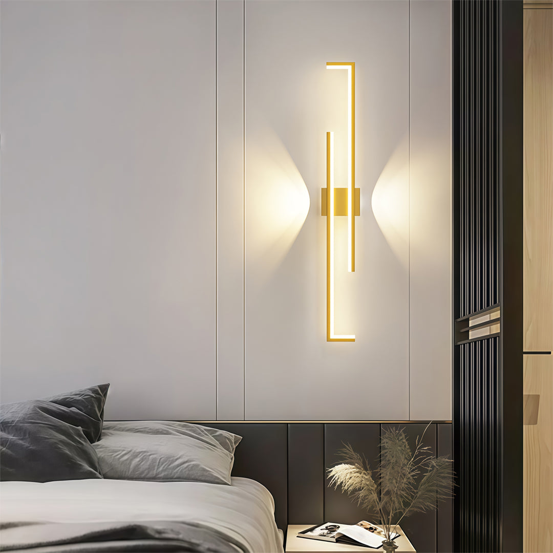 Close-up view of wall art led lights highlighting sleek gold and black linear design.