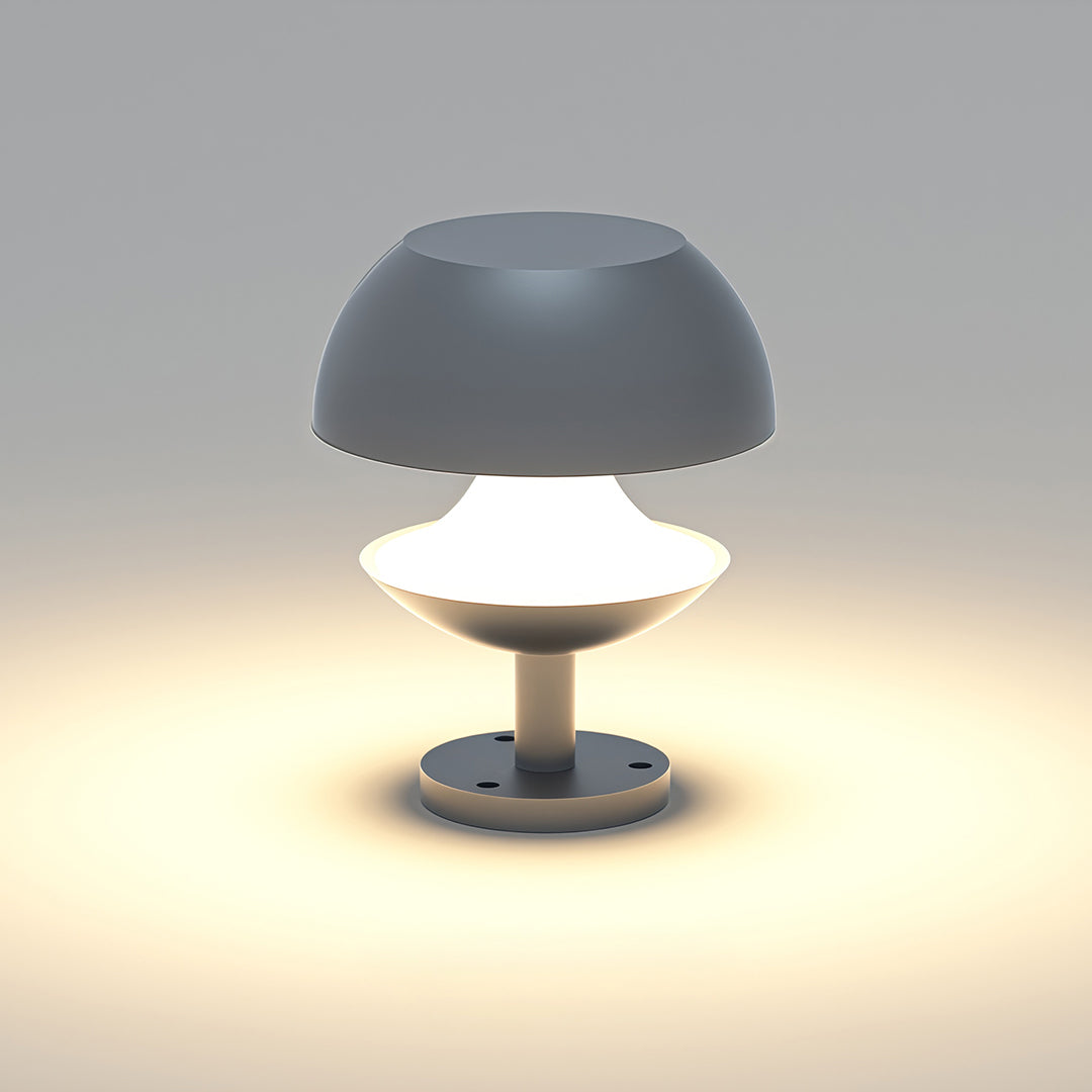 Close-up of mushroom path light showing warm LED illumination with grey dome and white diffuser.