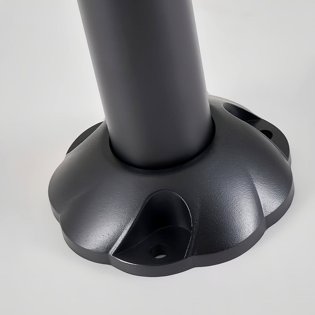 Close-up of the rugged textured base of the black solar bollard lights, designed for stable ground installation.