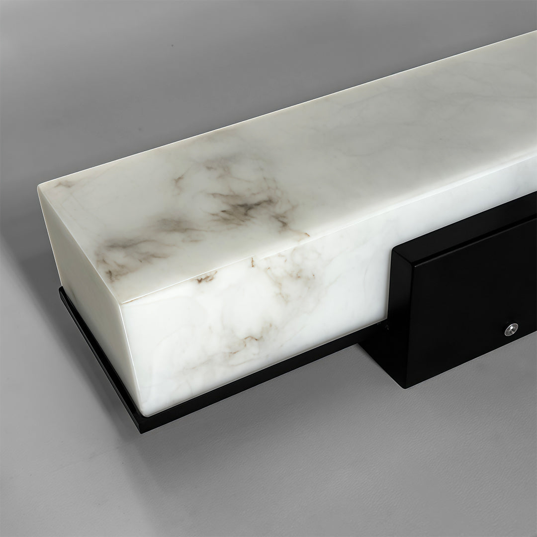 Square outdoor wall lights with a black frame, emphasizing the marble-like detail and modern design.