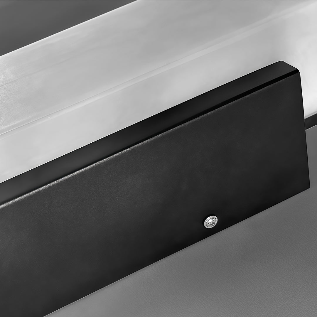 Square outdoor wall lights with a black frame, emphasizing the marble-like detail and modern design.