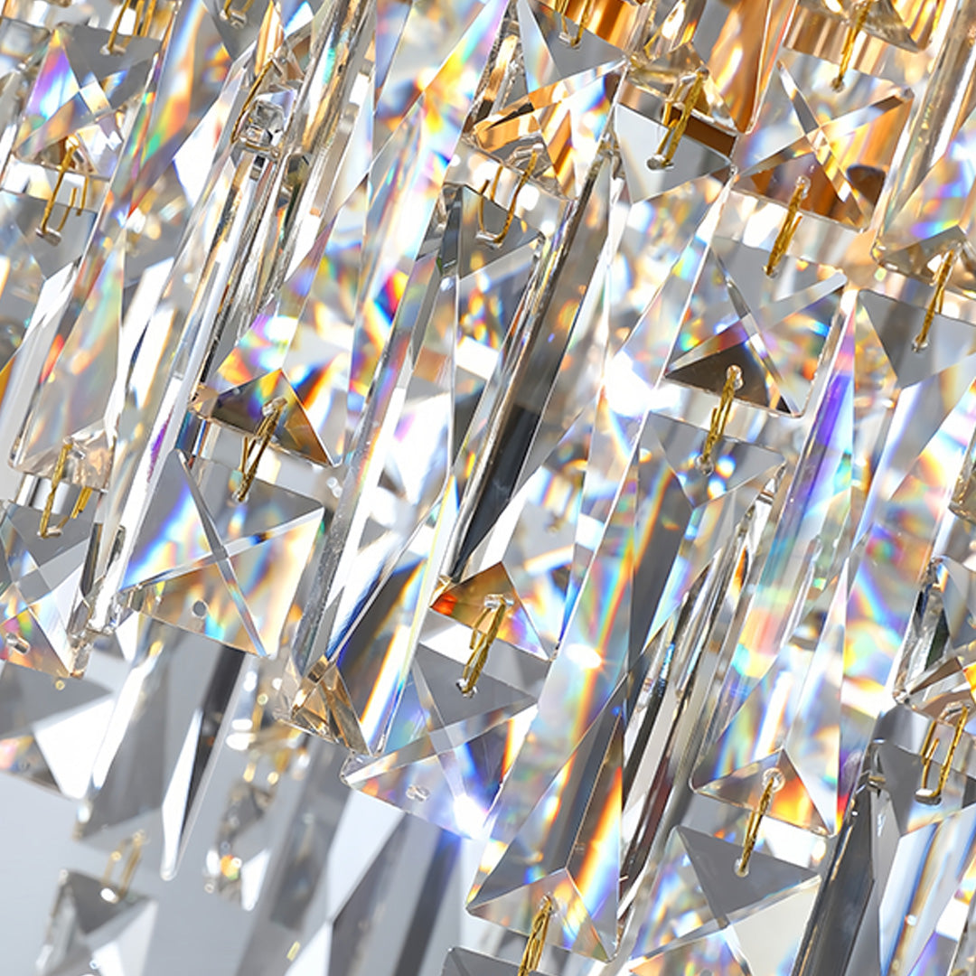 Grand tiered glass chandelier with cascading crystal tiers creating spectacular lighting centerpiece