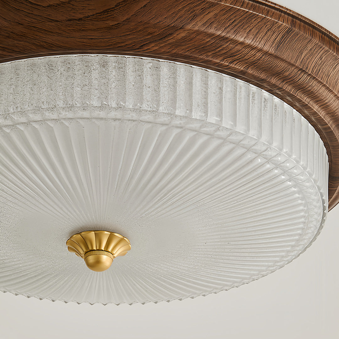 Close-up of vintage art deco flush mount ceiling light glass, detailed view of frosted design