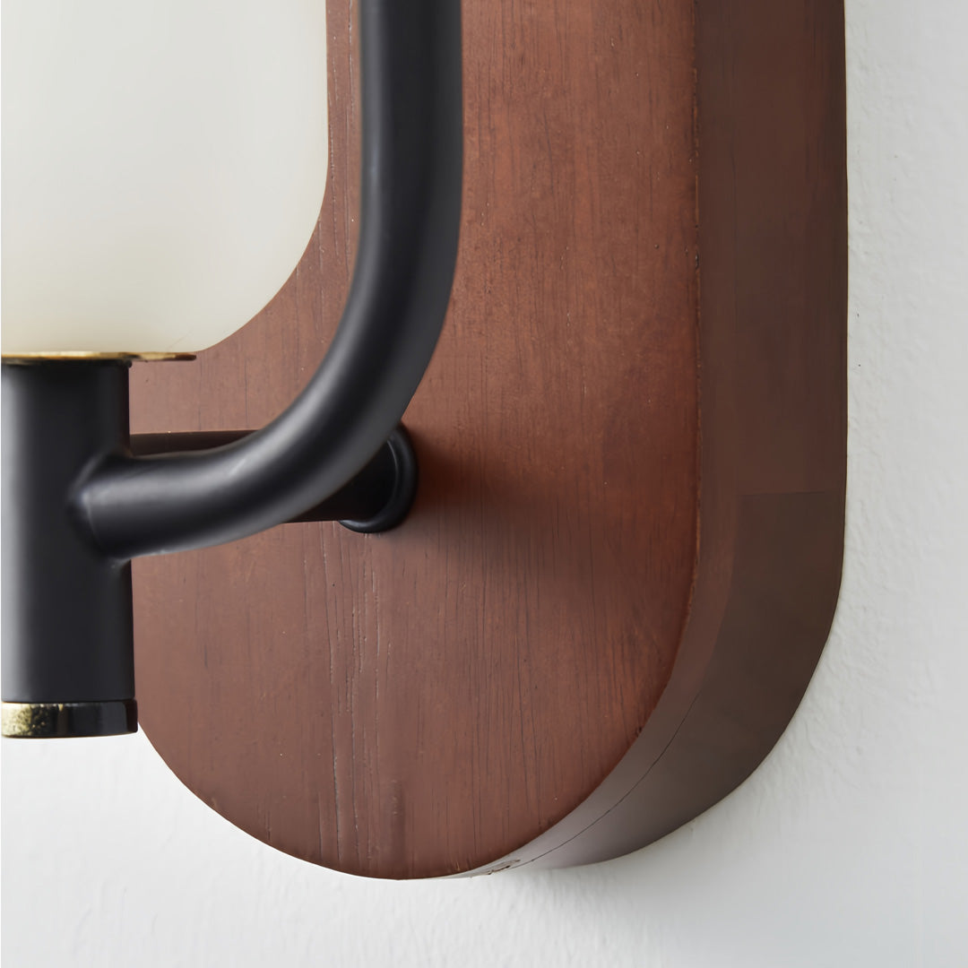 Close-up view of wall mount outdoor solar lights with smooth wooden housing.