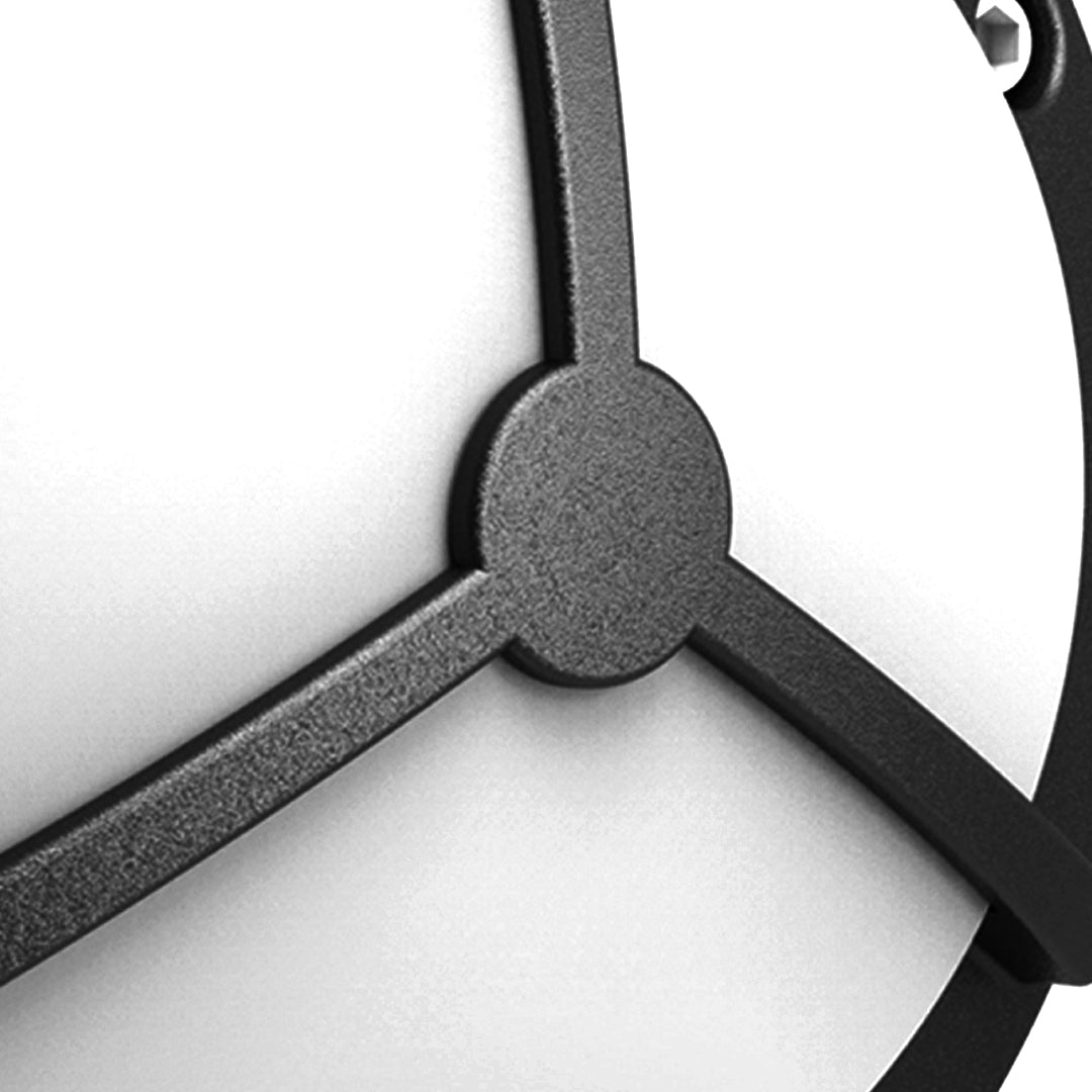 Close-up detail of waterproof outdoor wall lighting showing central hub and three radiating arms